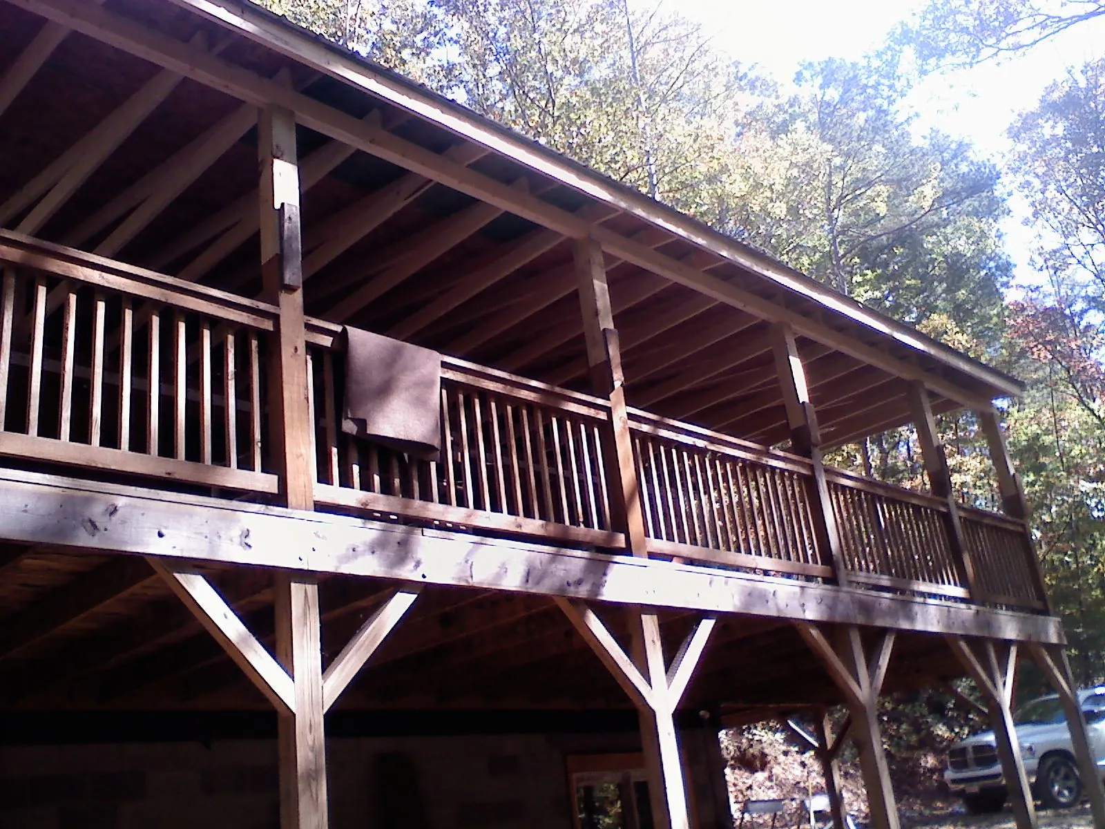 Timber framing under a new elevated porch and deck — Roof Leak Repair in Stromsburg by Roofing Brothers